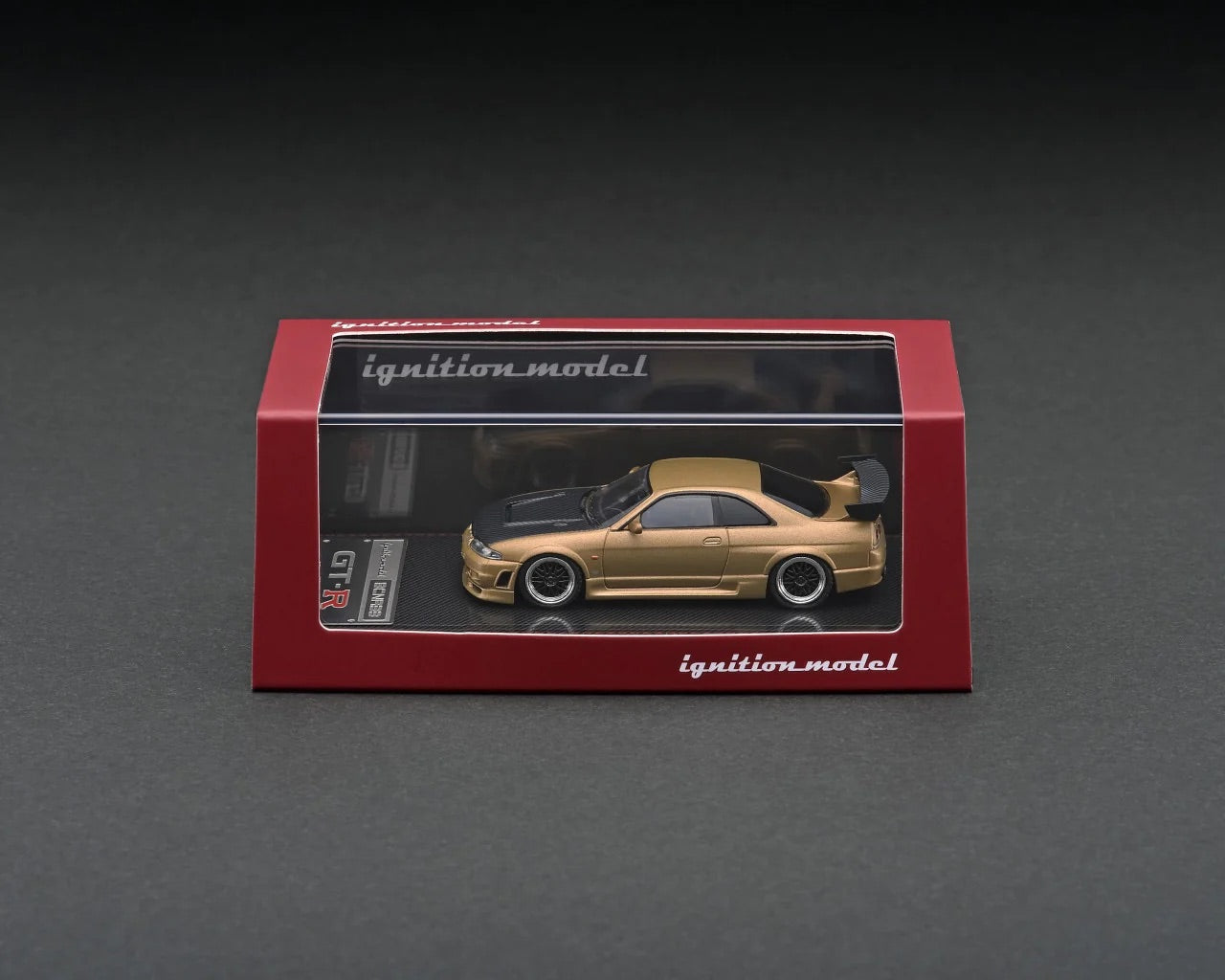 Ignition-Model Nissan Skyline GT-R R33 (BCNR33) RHD Matte Gold w/ Carbon Fiber Hood 1:64